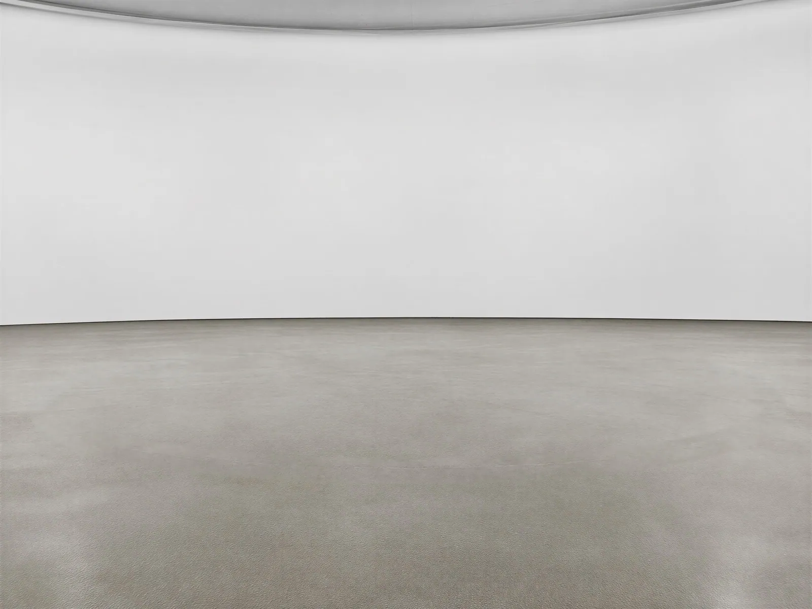 The “White backdrop, taupe floor” background on its own, with no vehicle.
