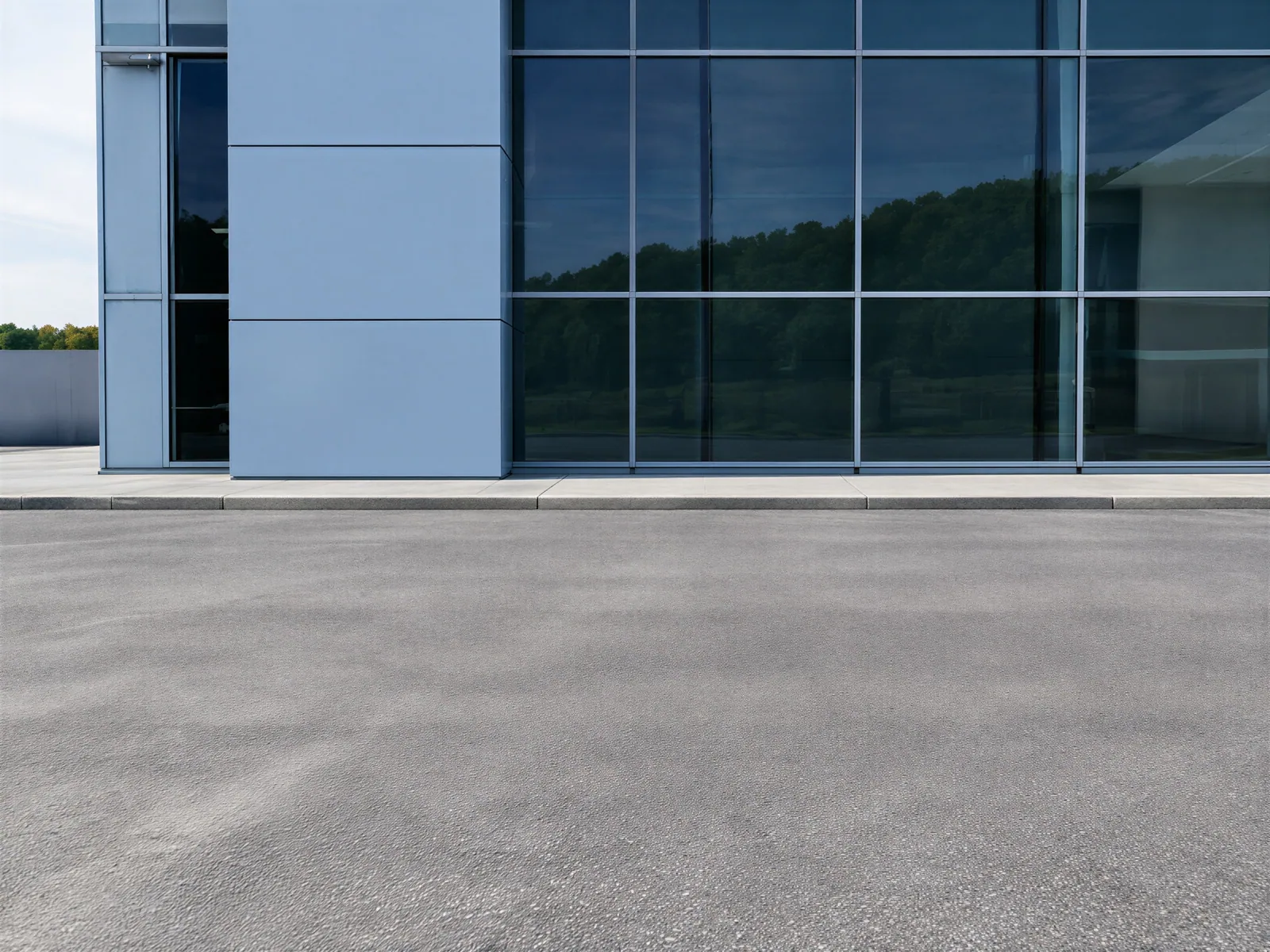 The “Glass dealership front, asphalt lot” background on its own, with no vehicle.