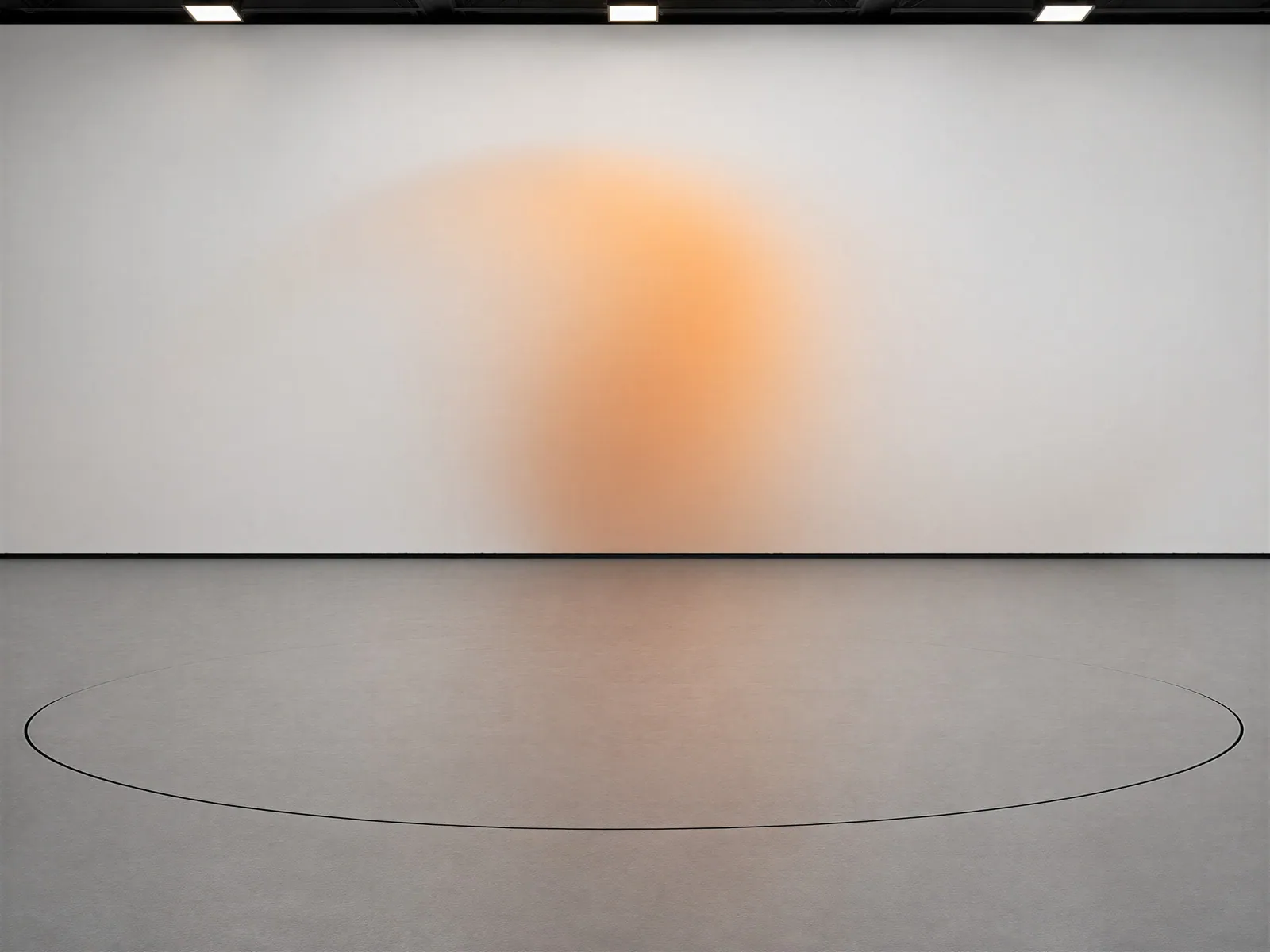 The “White wall, amber glow, ring” background on its own, with no vehicle.